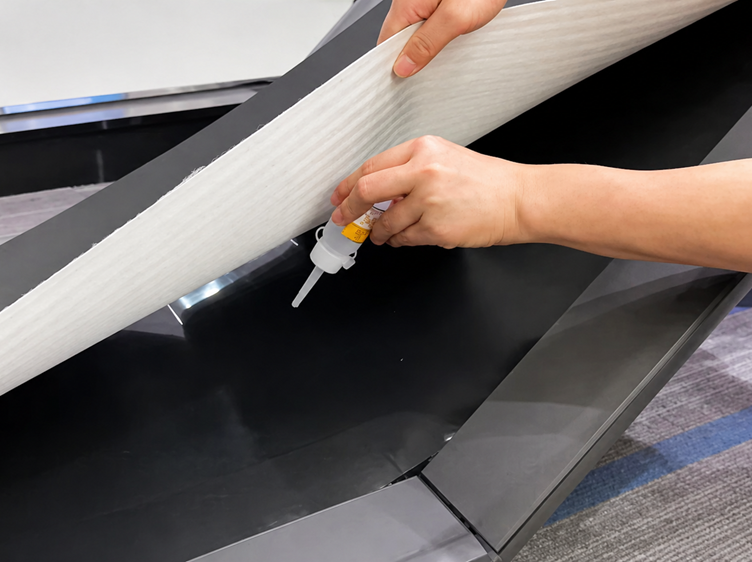Applying silicone oil under a treadmill belt for maintenance and smooth performance